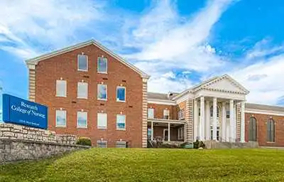 Outside of brick building with columns