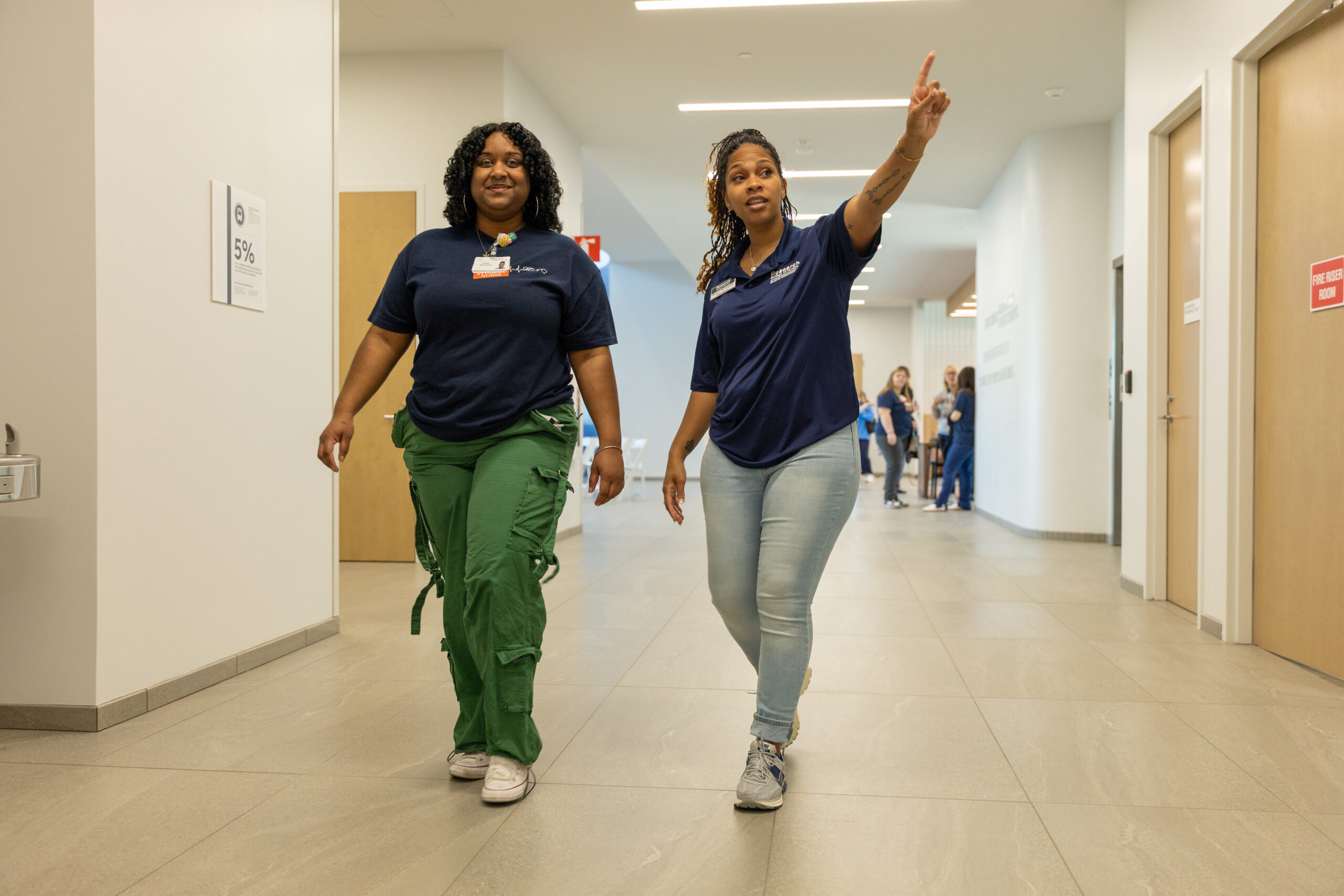 Students giving a tour at Research College of Nursing.
