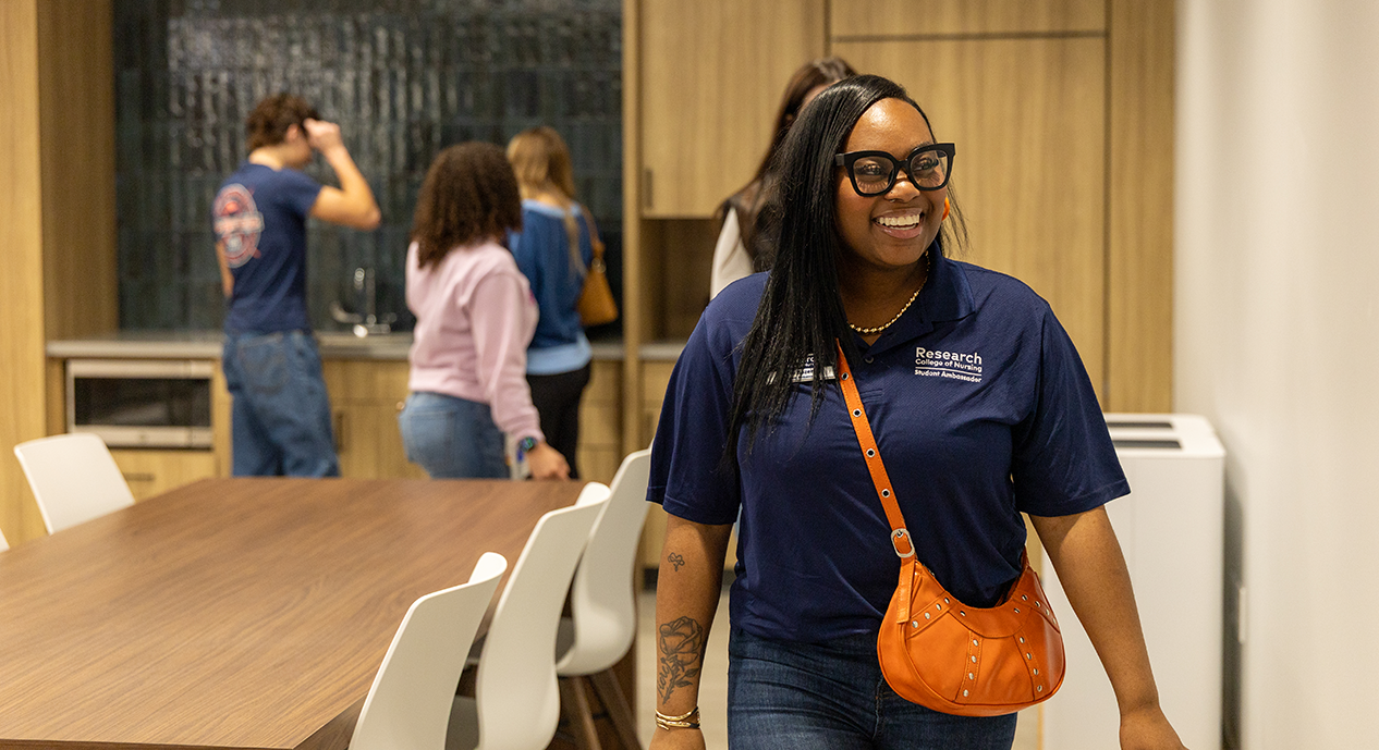 Student ambassador giving a tour to prospective students.