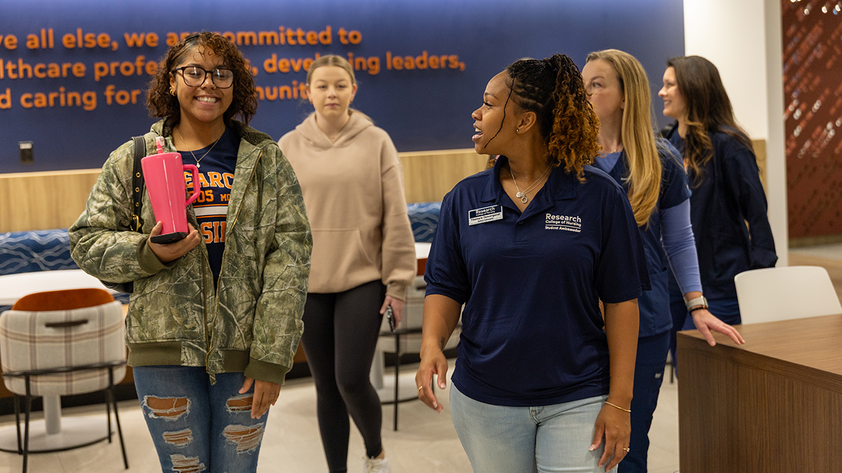 Student ambassador giving a tour to new students.